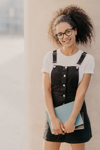 Portrait of a smiling young woman