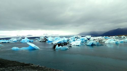 Scenic view of iceberg on sea