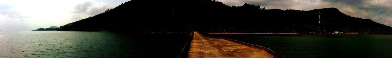 View of buildings against cloudy sky