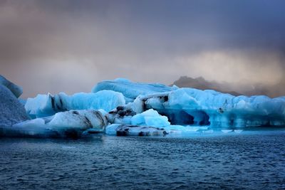 Scenic view of sea against sky during winter