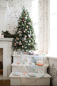 Christmas tree on table at home