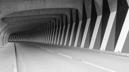 Road leading towards tunnel