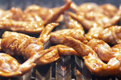 Close-up of meat on barbecue grill