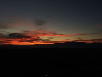 Scenic view of dramatic sky during sunset