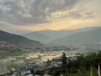 High angle view of townscape against sky during sunset