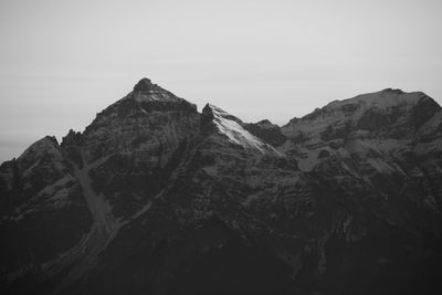 Low angle view of mountains against clear sky