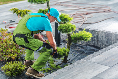 Gardener working at garden