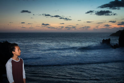 Scenic view of sea at sunset