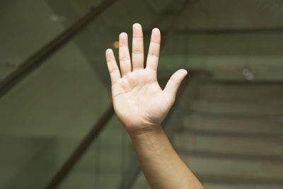 Close-up of woman hand on blurred background