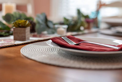 Close-up of kitchen utensils on table