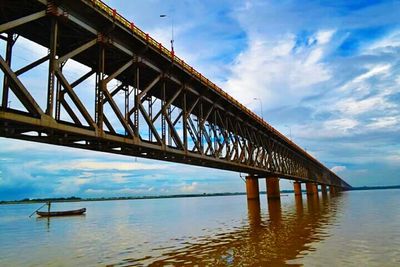 Low angle view of bridge over river