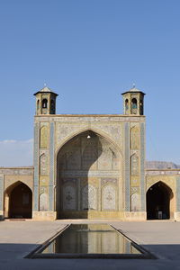 View of historical building against clear blue sky