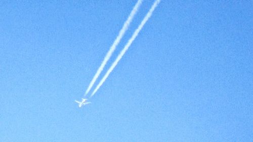 Low angle view of vapor trail in sky