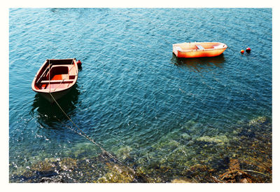 High angle view of boat floating on sea