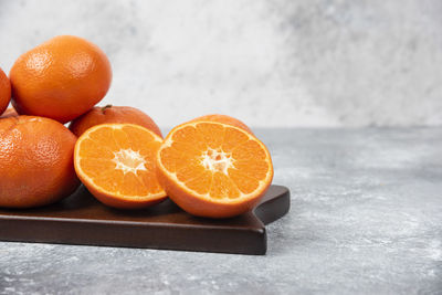 Close-up of oranges on table