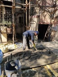 Mason worker working with concrete