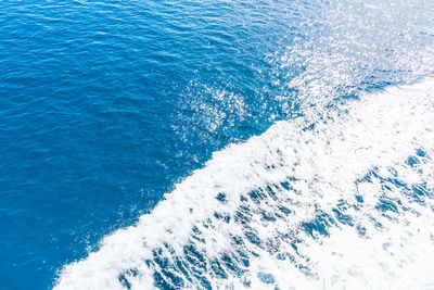 High angle view of water splashing in sea