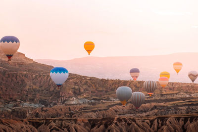 View of hot air balloons at sunset
