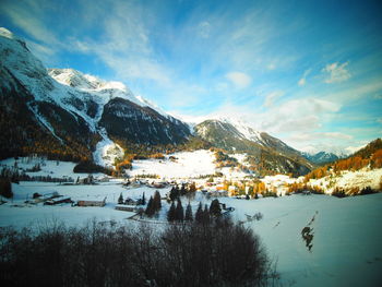 Scenic view of snowcapped mountains against sky