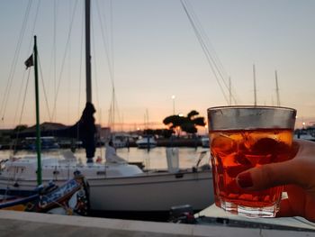 View of a boat in the sea at sunset