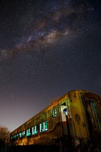 Low angle view of building against sky at night