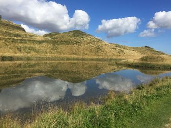 Scenic view of lake against sky