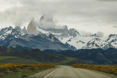 Scenic view of snowcapped mountains against sky