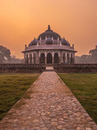 Scenic view of field against sky during sunset