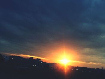 Sun shining through clouds