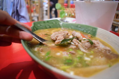 Close-up of soup in bowl on table