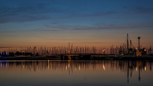 Boats moored at harbor