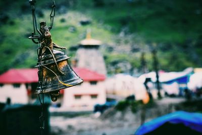 Close-up of toy hanging on tree