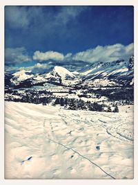 Scenic view of snow covered mountains