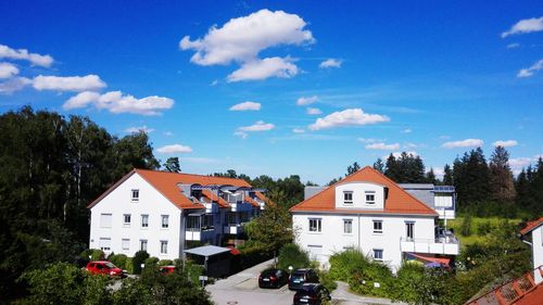 Houses against sky in city