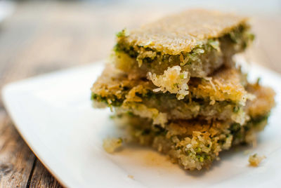 Close-up of sweet food served in plate on wooden table