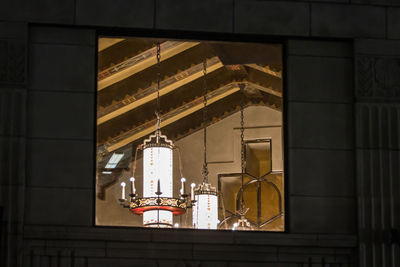 Low angle view of illuminated building at night