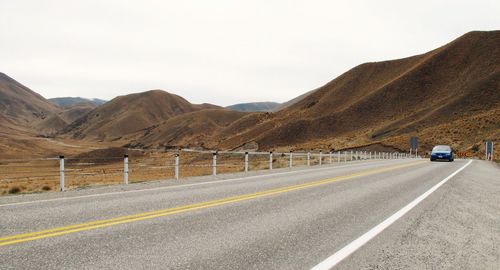 Car on road against mountains