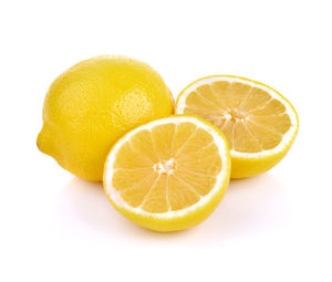 Close-up of fruits against white background