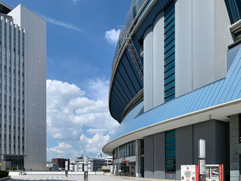 Low angle view of modern buildings against sky