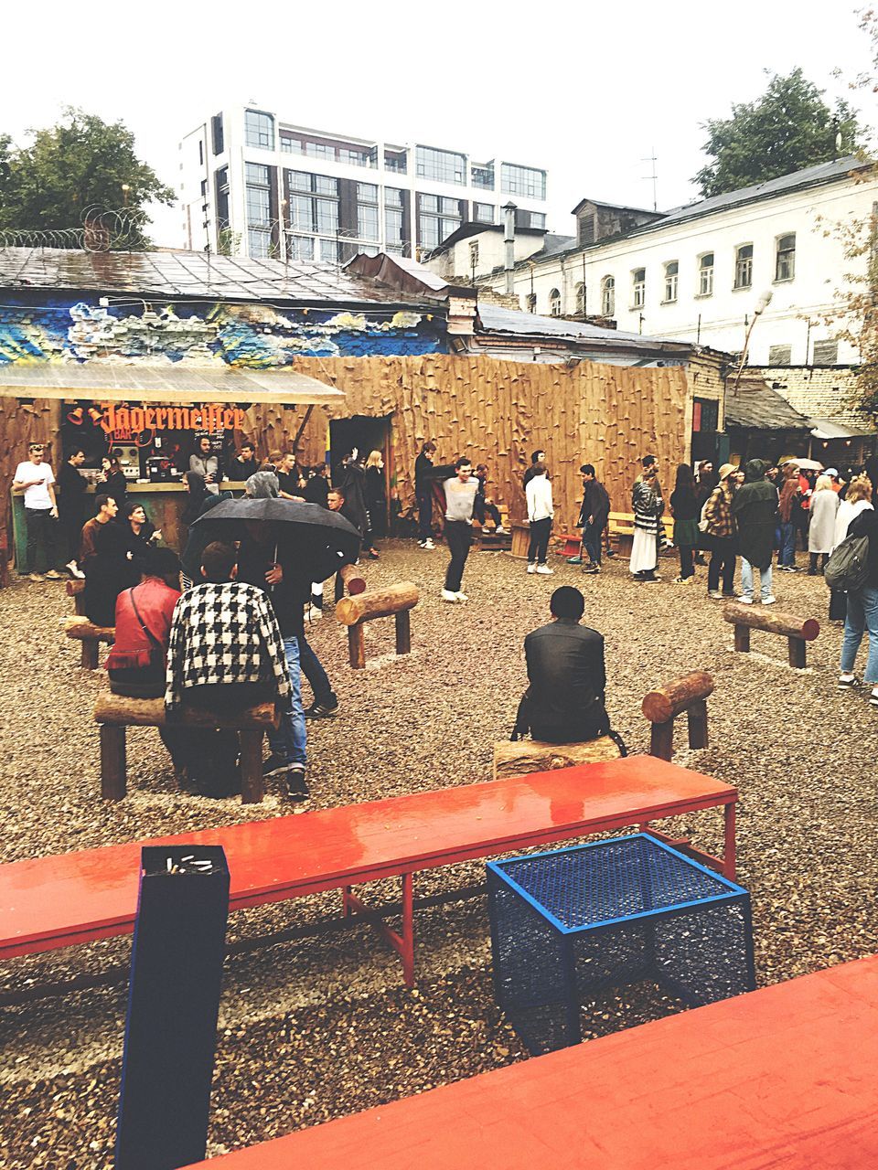 building exterior, architecture, built structure, city, wet, full length, water, togetherness, outdoors, person, day, crowd, city life