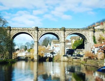 Reflection of bridge in water