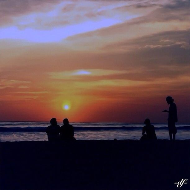 sunset, water, silhouette, sea, horizon over water, togetherness, lifestyles, leisure activity, beach, sky, men, beauty in nature, scenics, orange color, bonding, shore, love, tranquil scene