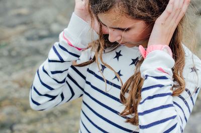 Midsection of girl looking down