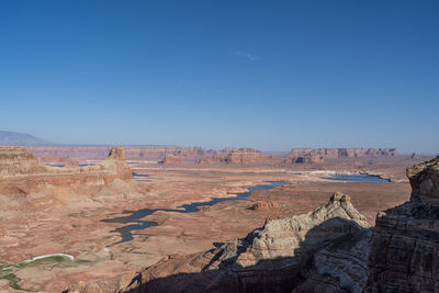 Lake powell  with historical low water levels seen from alstrom point during  drought in may 2022.