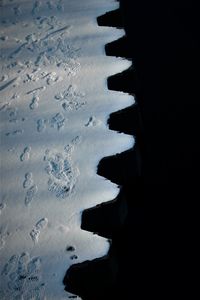 High angle view of silhouette people on beach