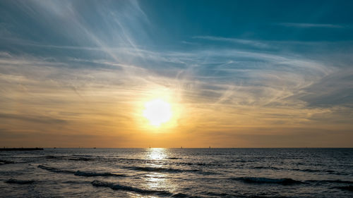 Scenic view of sea against sky during sunset