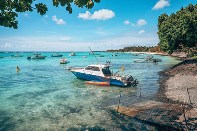 Boat in sea against sky