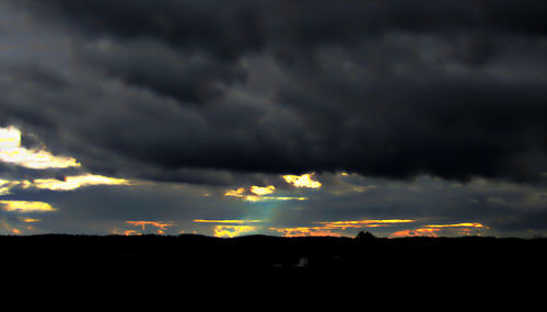 Scenic view of dramatic sky during sunset