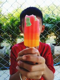 Person holding ice cream cone