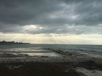 Scenic view of beach against sky